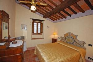 מיטה או מיטות בחדר ב-Margherita Holiday Home