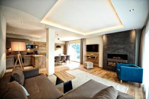 TV in/ali zabaviščno središče v nastanitvi Hotel Dorfstadl