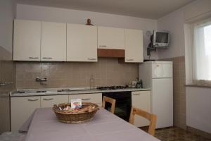 A kitchen or kitchenette at Casa Martello