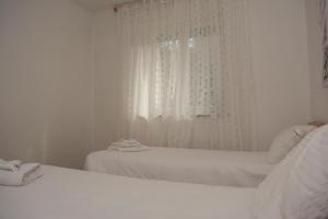A bed or beds in a room at Casa Martello