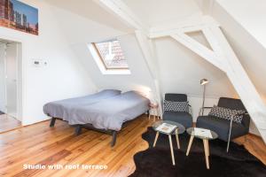 Postel nebo postele na pokoji v ubytování Hotel de Vischpoorte, hartje Deventer en aan de IJssel