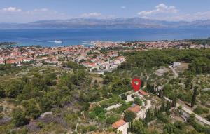 an aerial view of a town with a red stop sign at Holiday Home Blossom in Supetar