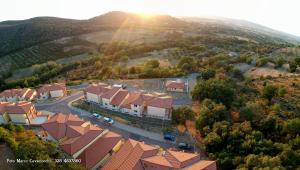 an aerial view of a village with houses at Bicchi Belvedere Scarlino in Scarlino