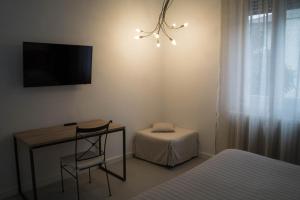 Postel nebo postele na pokoji v ubytování Casa Chiara B&B