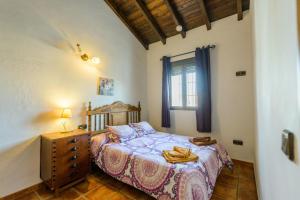 Posteľ alebo postele v izbe v ubytovaní Cubo's Casa La Viña + 24 fotografií