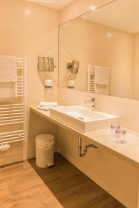 Kúpeľňa v ubytovaní Familiengut Hotel Burgstaller