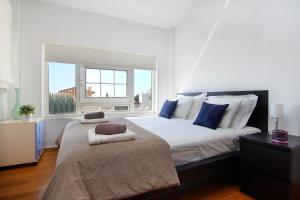 Posteľ alebo postele v izbe v ubytovaní Oasis Pool House by GHH + 37 fotografií