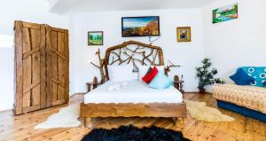 Postel nebo postele na pokoji v ubytování Castelul de Vis