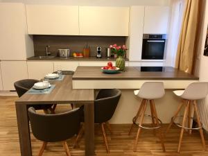 Kuchyň nebo kuchyňský kout v ubytování Ferienwohnung am Hauptbahnhof
