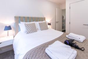 Giường trong phòng chung tại City Stay Apartments - Platform Bedford