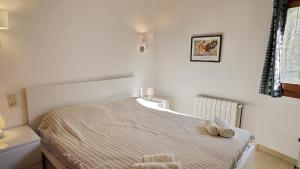 Ein Bett oder Betten in einem Zimmer der Unterkunft Villa Yvonne - chill out, free WIFI, close to facilities