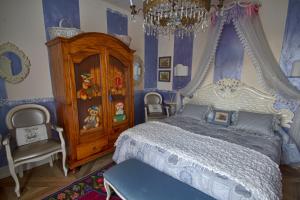 Postel nebo postele na pokoji v ubytování B&B La Maison degli Angeli