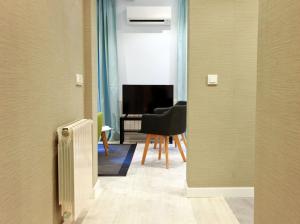 Część wypoczynkowa w obiekcie Feelathome Madrid Suites Apartments