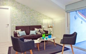 Część wypoczynkowa w obiekcie Feelathome Madrid Suites Apartments