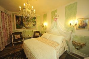Postel nebo postele na pokoji v ubytování B&B La Maison degli Angeli