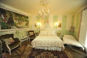 Postel nebo postele na pokoji v ubytování B&B La Maison degli Angeli
