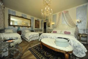 Postel nebo postele na pokoji v ubytování B&B La Maison degli Angeli