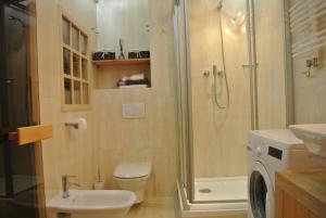 Kúpeľňa v ubytovaní Apartament Królewski Superior z sauną