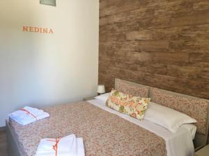 Postel nebo postele na pokoji v ubytování Messapia Casa Vacanze