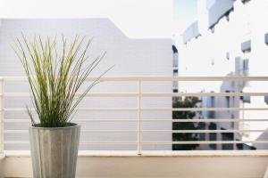 A balcony or terrace at Lets Holidays White apartment with terrace, ac & parking, near beach