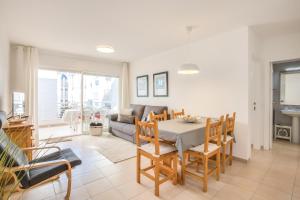 A seating area at Lets Holidays White apartment with terrace, ac & parking, near beach