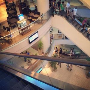 an overhead view of a shopping mall with people at San Stefano Grand Plaza in Alexandria