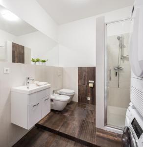 Koupelna v ubytování Codelli Deluxe City Centre Apartments