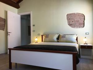 Ein Bett oder Betten in einem Zimmer der Unterkunft Dal Marinaio