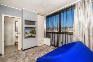 Ένα ή περισσότερα κρεβάτια σε δωμάτιο στο The View Luxury Rooms