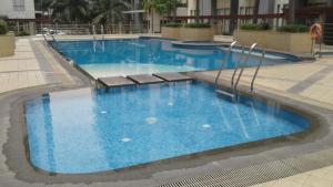 Swimmingpoolen hos eller tæt på One Palm Tree Apartments