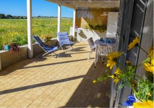 Balkón alebo terasa v ubytovaní Casa Vacanze Portopalo di Capopassero