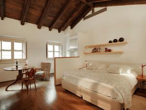 Postel nebo postele na pokoji v ubytování Boutique Hotel Albero Nascosto