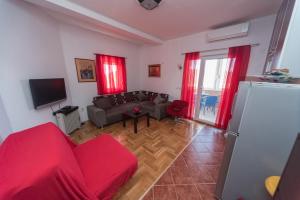 TV a/nebo společenská místnost v ubytování Apartmani Jazz Aleksandra