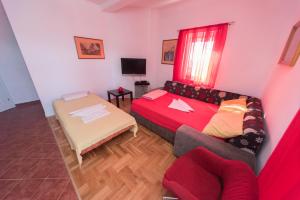 Postel nebo postele na pokoji v ubytování Apartmani Jazz Aleksandra