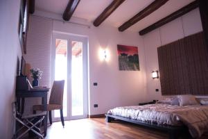 Tenuta La Vigna客房内的一张或多张床位