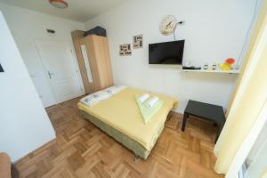 TV a/nebo společenská místnost v ubytování Apartmani Jazz Aleksandra