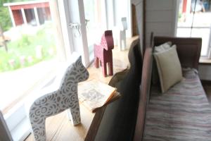 Posezení v ubytování Kolarbo Gård B&B