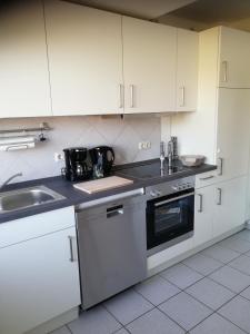 Kuchyň nebo kuchyňský kout v ubytování Ferienwohnung "Zur Biene"
