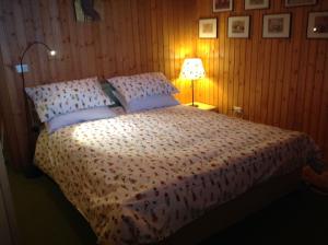 Un pat sau paturi într-o cameră la Casamia