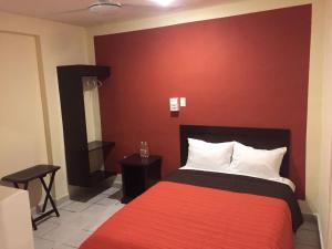 Postel nebo postele na pokoji v ubytování Hotel Maya Becan