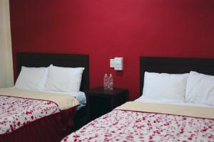 Postel nebo postele na pokoji v ubytování Hotel Maya Becan