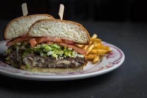 a sandwich and french fries on a plate at Downtown Grand Hotel & Casino in Las Vegas