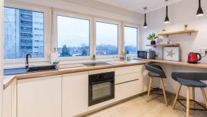 Kuchyň nebo kuchyňský kout v ubytování UrbanApartment in CENTER #FREEPARKING #COZY