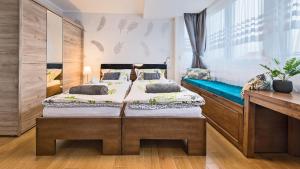 Postel nebo postele na pokoji v ubytování UrbanApartment in CENTER #FREEPARKING #COZY
