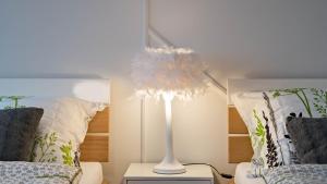 Postel nebo postele na pokoji v ubytování UrbanApartment in CENTER #FREEPARKING #COZY