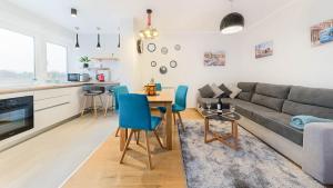 a living room with a couch and a table at UrbanApartment in CENTER #FREEPARKING #COZY in Zagreb