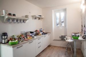 Kuchyň nebo kuchyňský kout v ubytování Al Rost B&B + 25 fotografií