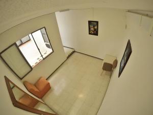 an overhead view of a living room with a window at Pension Euro Holitel in Fuengirola