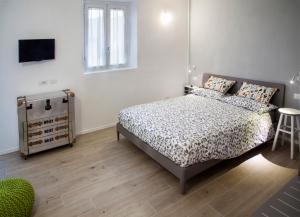 Postel nebo postele na pokoji v ubytování Al Rost B&B