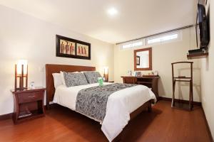 Ένα ή περισσότερα κρεβάτια σε δωμάτιο στο Loft Hotel